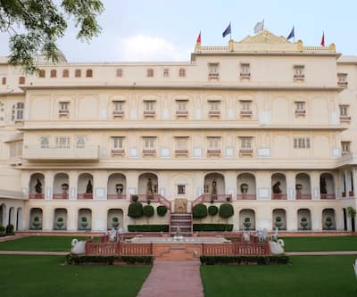 https://imgcld.yatra.com/ytimages/image/upload/t_hotel_yatra_city_desktop/v1432031383/Domestic Hotels/Hotels_Jaipur/The Raj Palace/Overview.jpg